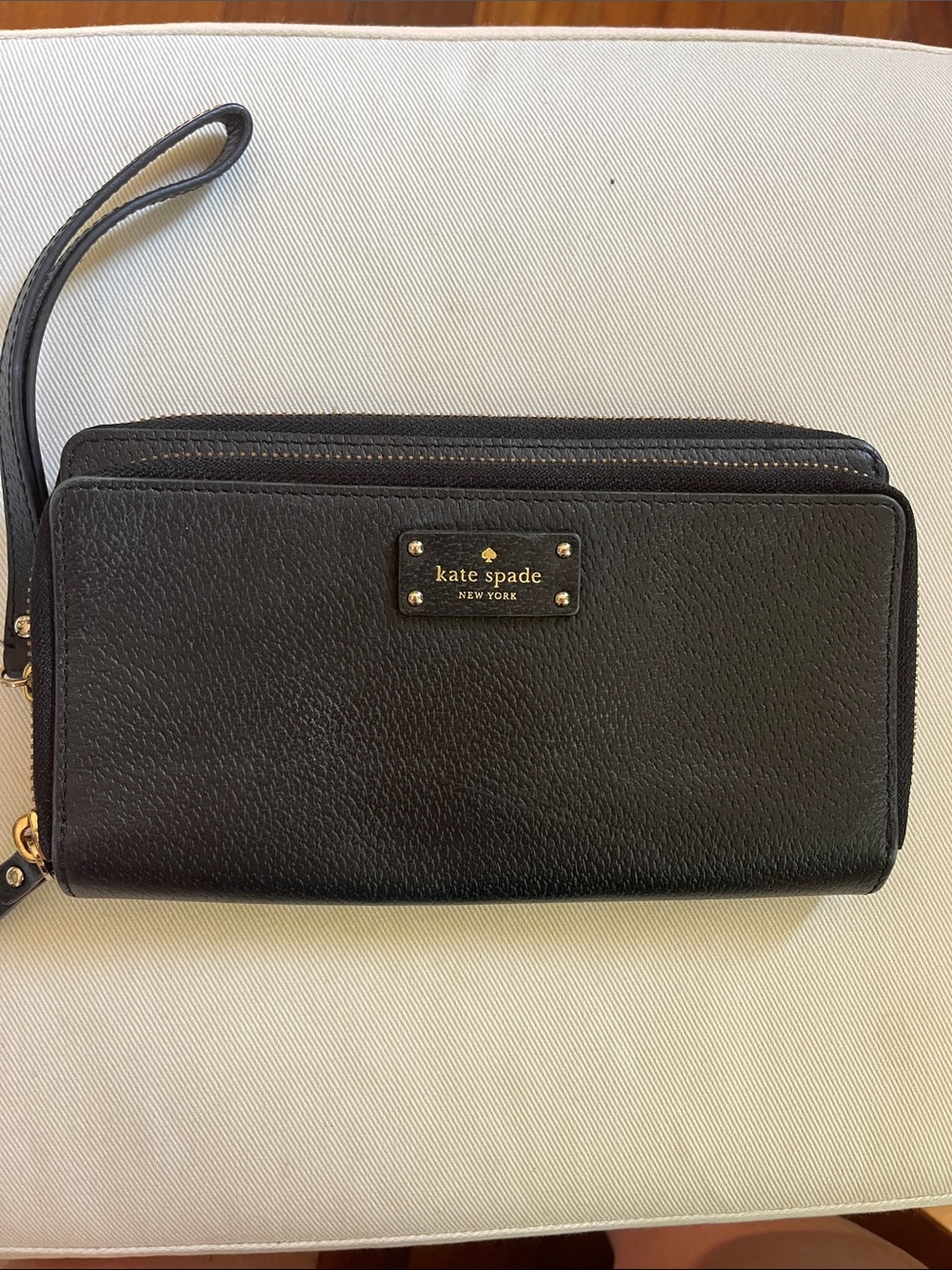 kate spade Black Pebbled Leather Wristlet Wallet with Gold Plaque